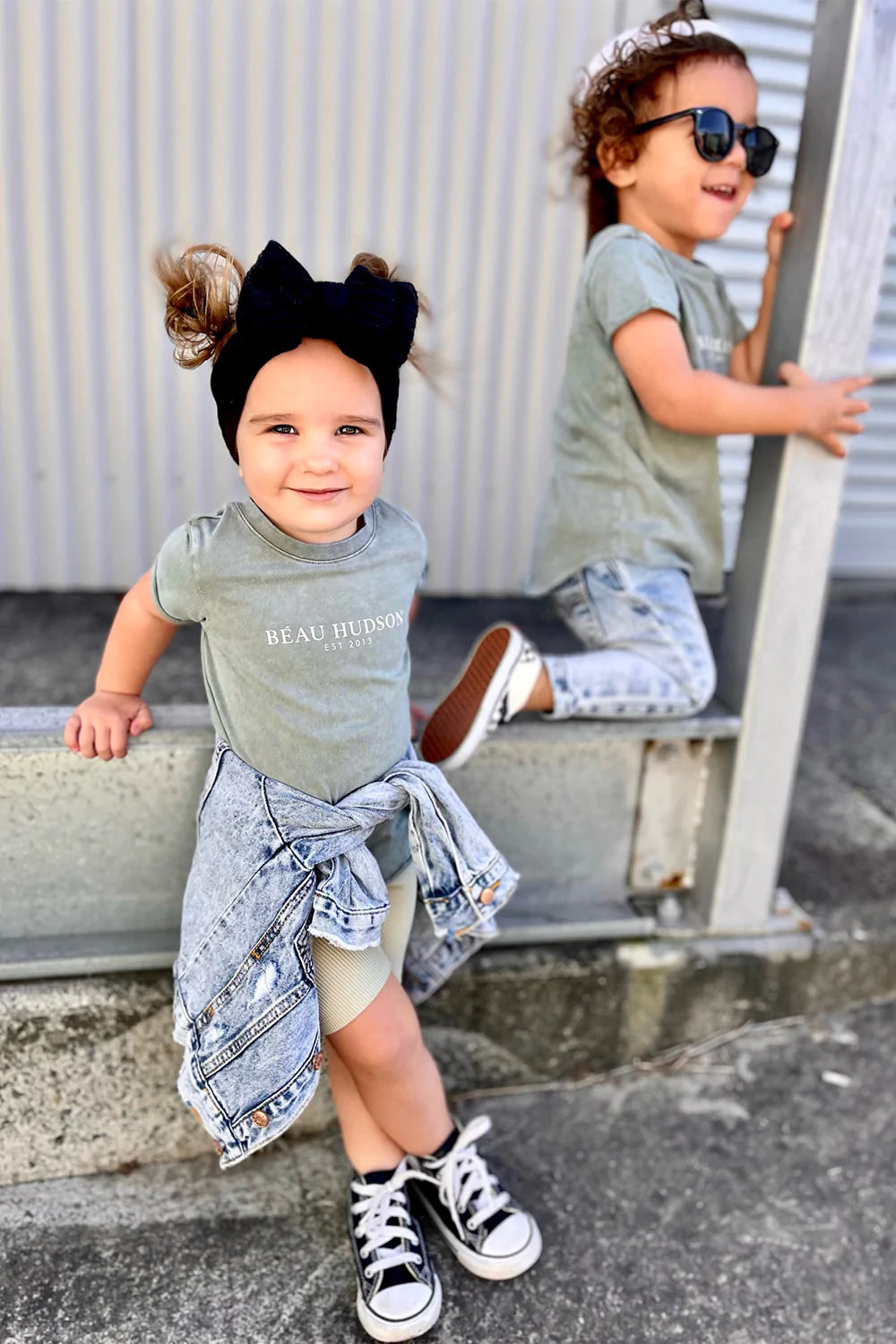 Baby girl wearing best sale converse shoes